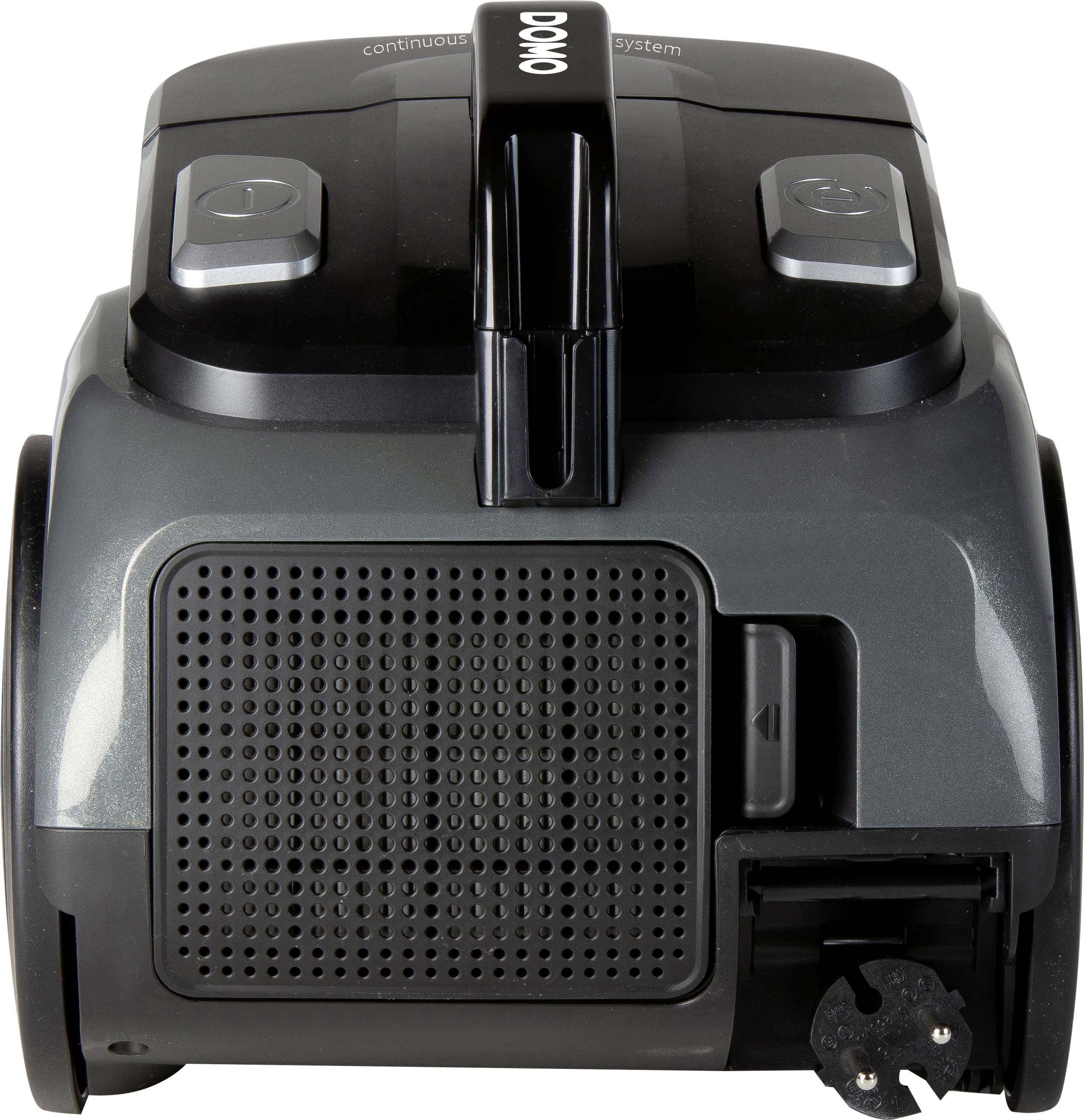 Un aspirateur noir et gris vu de face, avec un réservoir à poussière amovible et des boutons de commande sur le dessus.