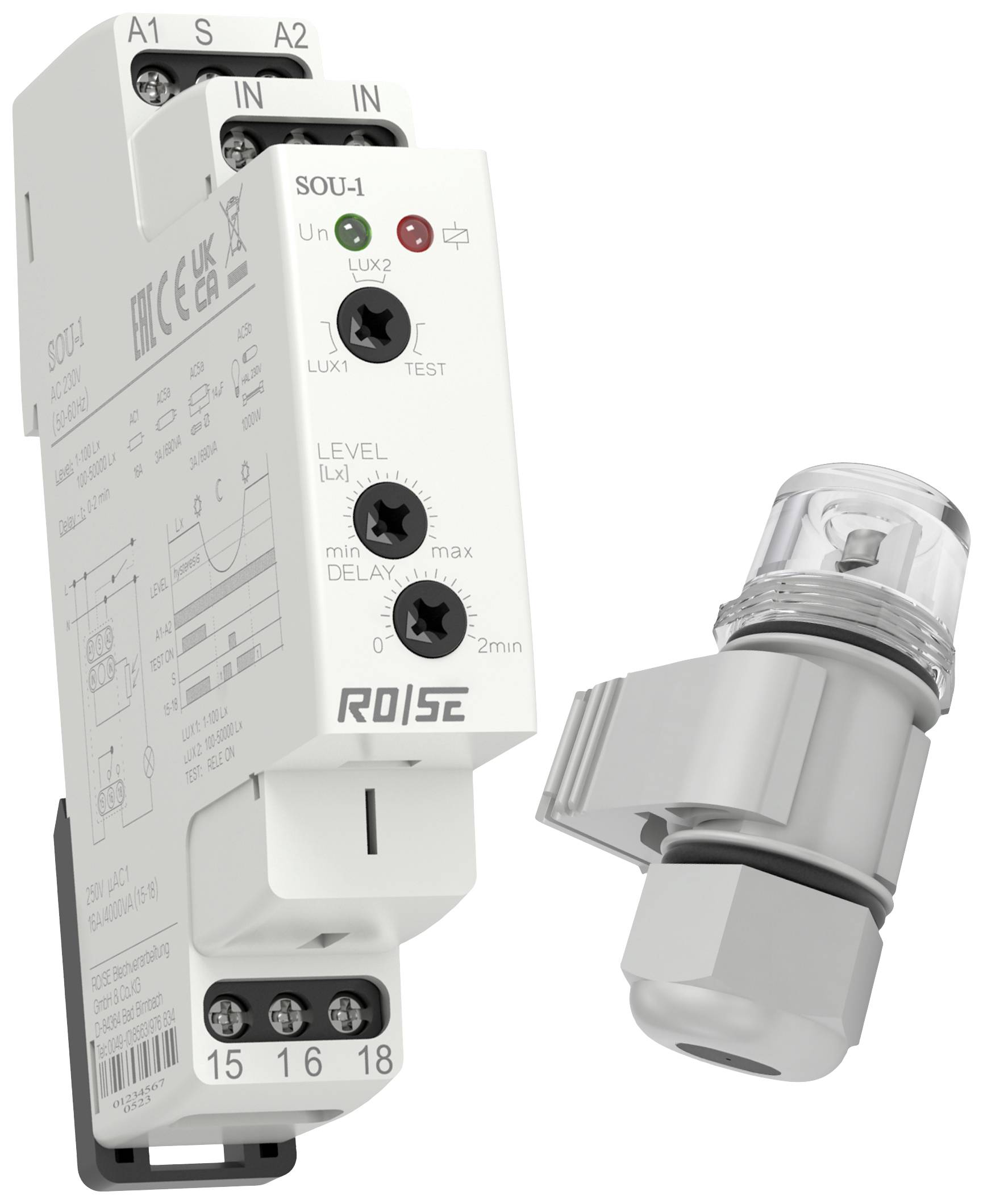 Module de relais électronique avec capteur de luminosité. L'étiquette indique les réglages des valeurs de lux et des temps de retard.