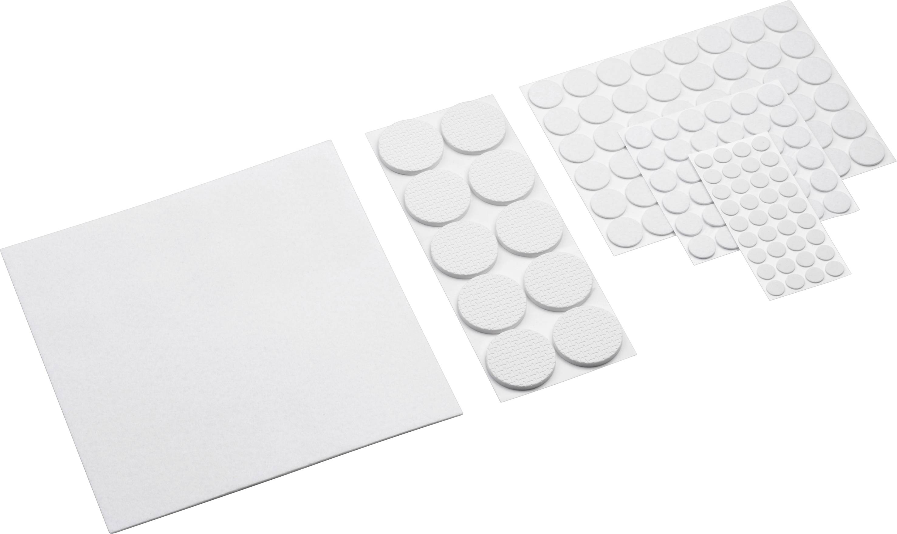 Tampons adhésifs circulaires de différentes tailles disposés côte à côte, adaptés pour fixer des objets sur des surfaces lisses.