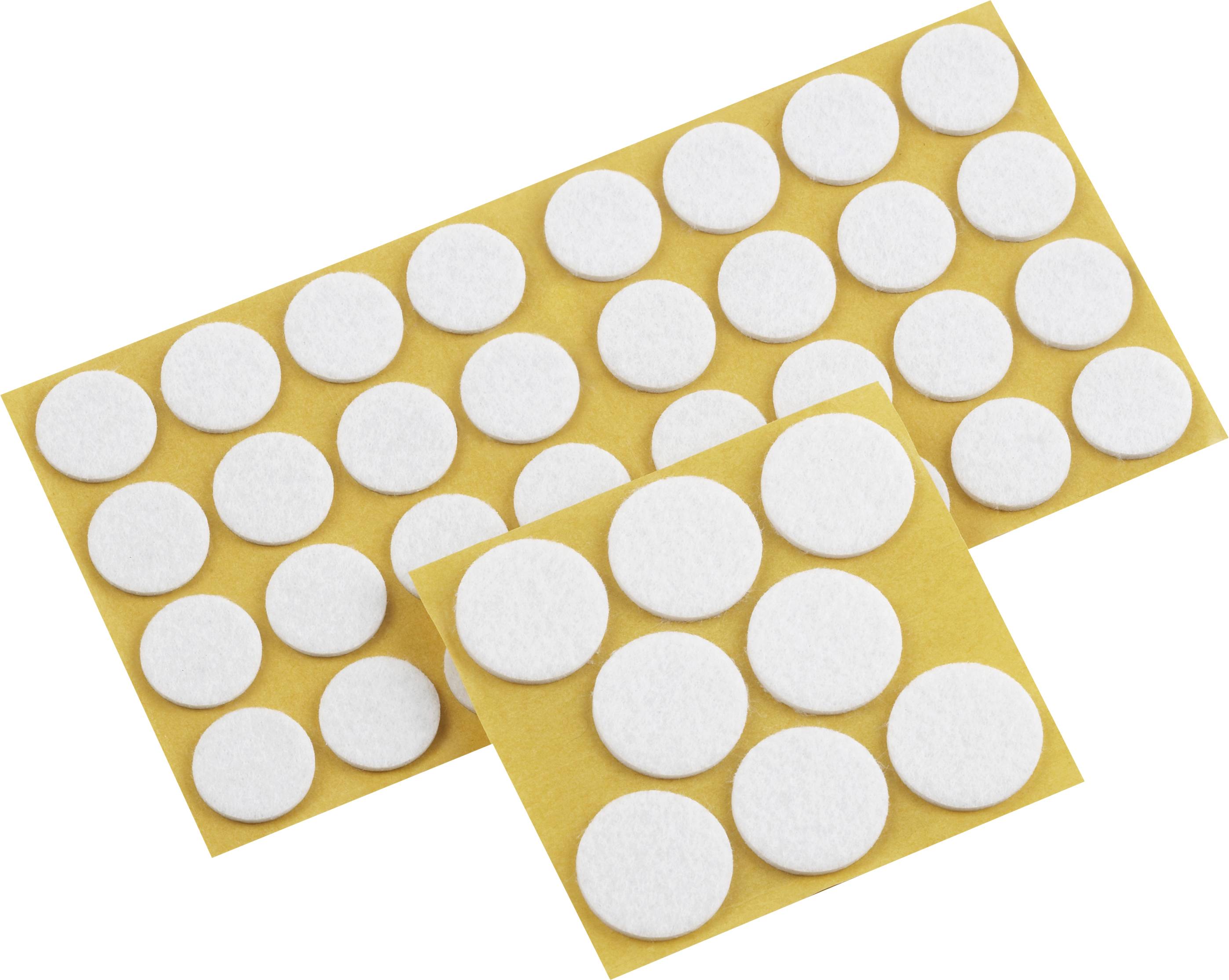 Patins de feutrine blancs, circulaires, sur papier support jaune, utilisés pour protéger les surfaces ou réduire le bruit des meubles.