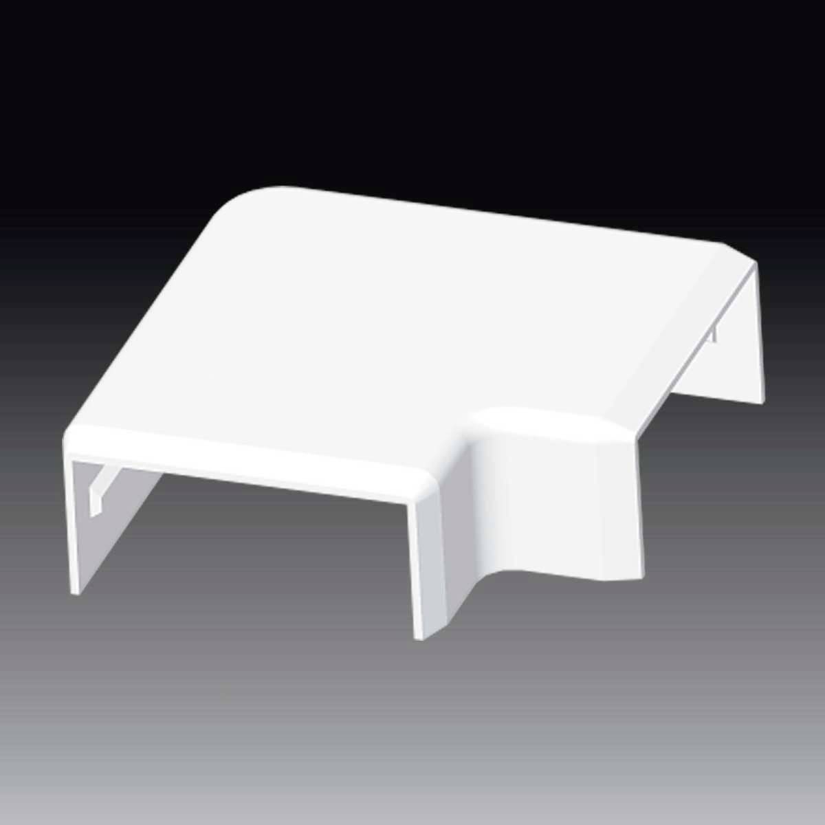 Un connecteur d'angle de goulotte de câbles blanc en forme de L sur un fond sombre. Pièce de jonction pour l'angle de deux goulottes.