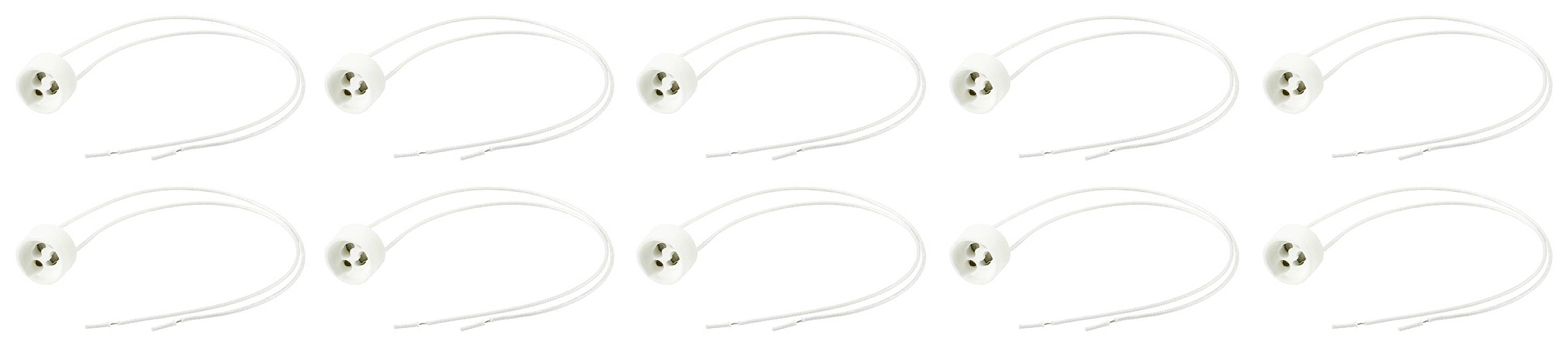 Dix supports de lampe en céramique blanche, chacun équipé de deux câbles, disposés en deux rangées. Idéal pour les projets de bricolage ou les réparations de lampes.