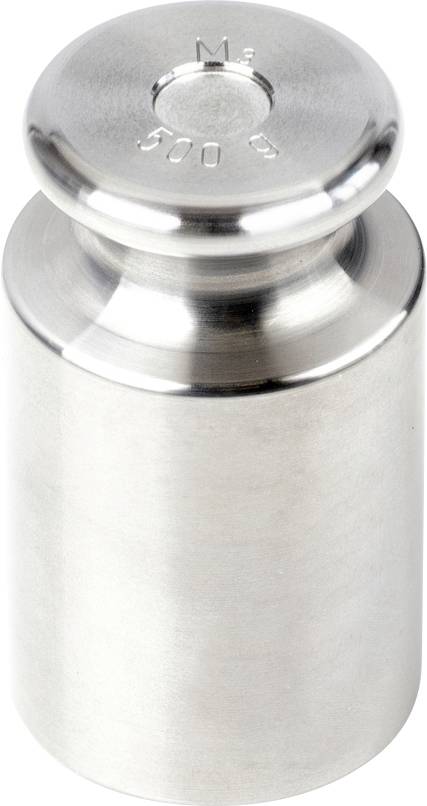 Un poids en argent gravé '500 g', de forme cylindrique et à surface supérieure plate, fréquemment utilisé pour des mesures précises.