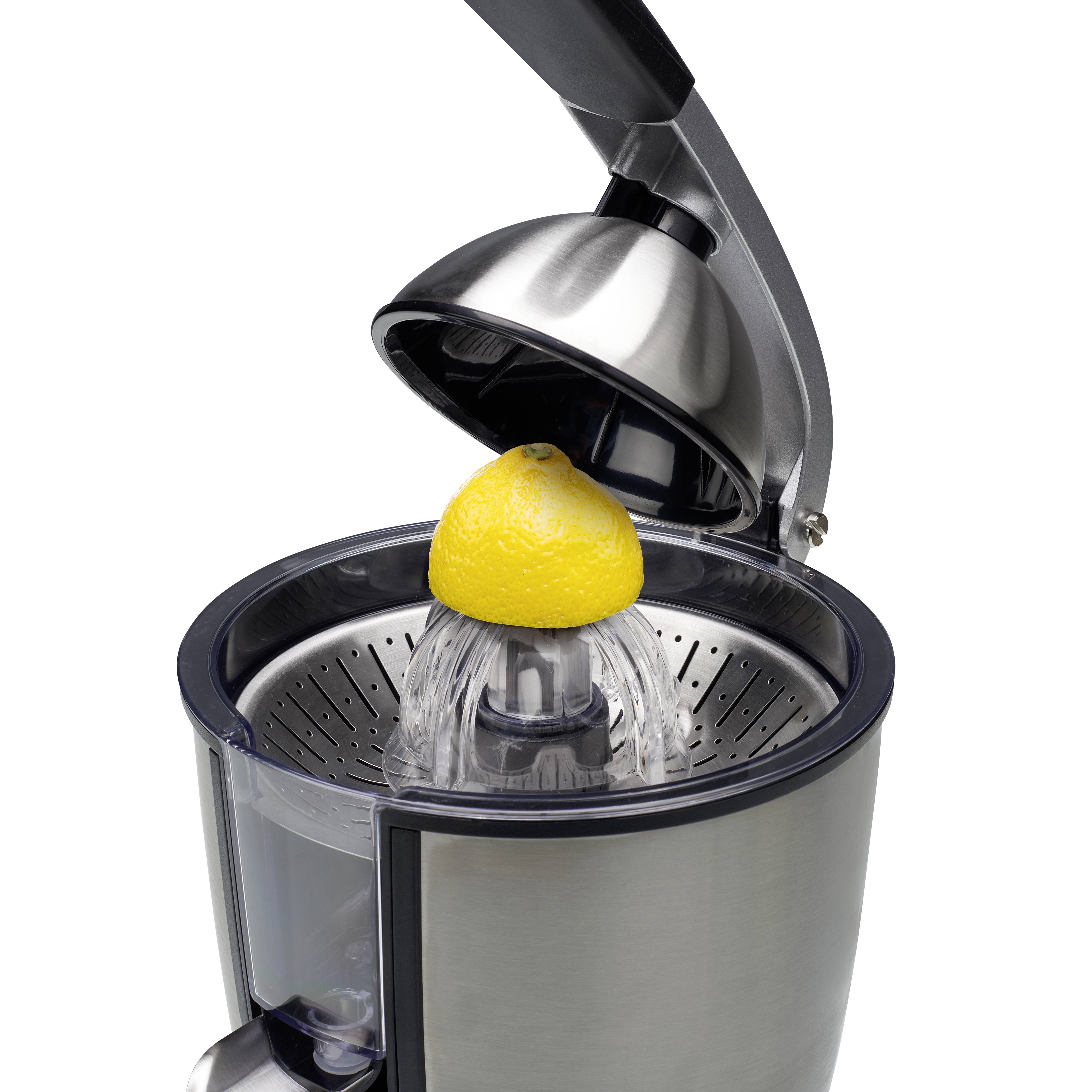 Un presse-agrumes électrique avec une demi-citron jaune sur le cône de pressage, prêt à extraire le jus.