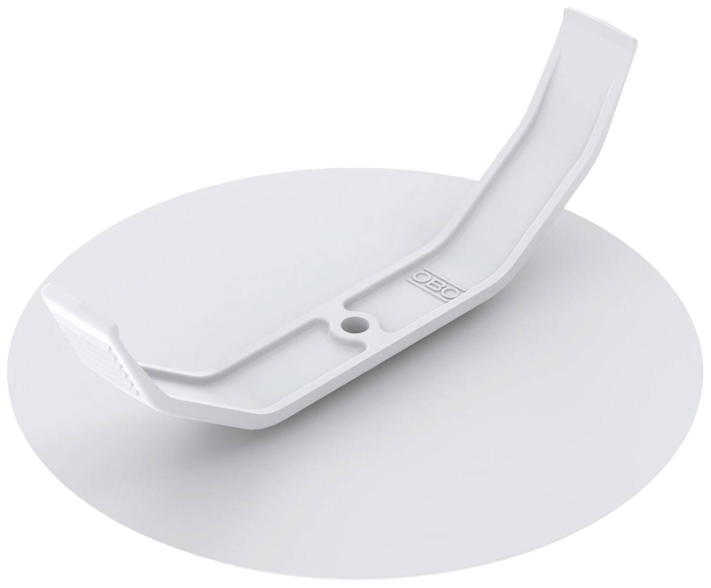 Un support incurvé blanc en plastique est placé en travers d'un disque rond et plat.