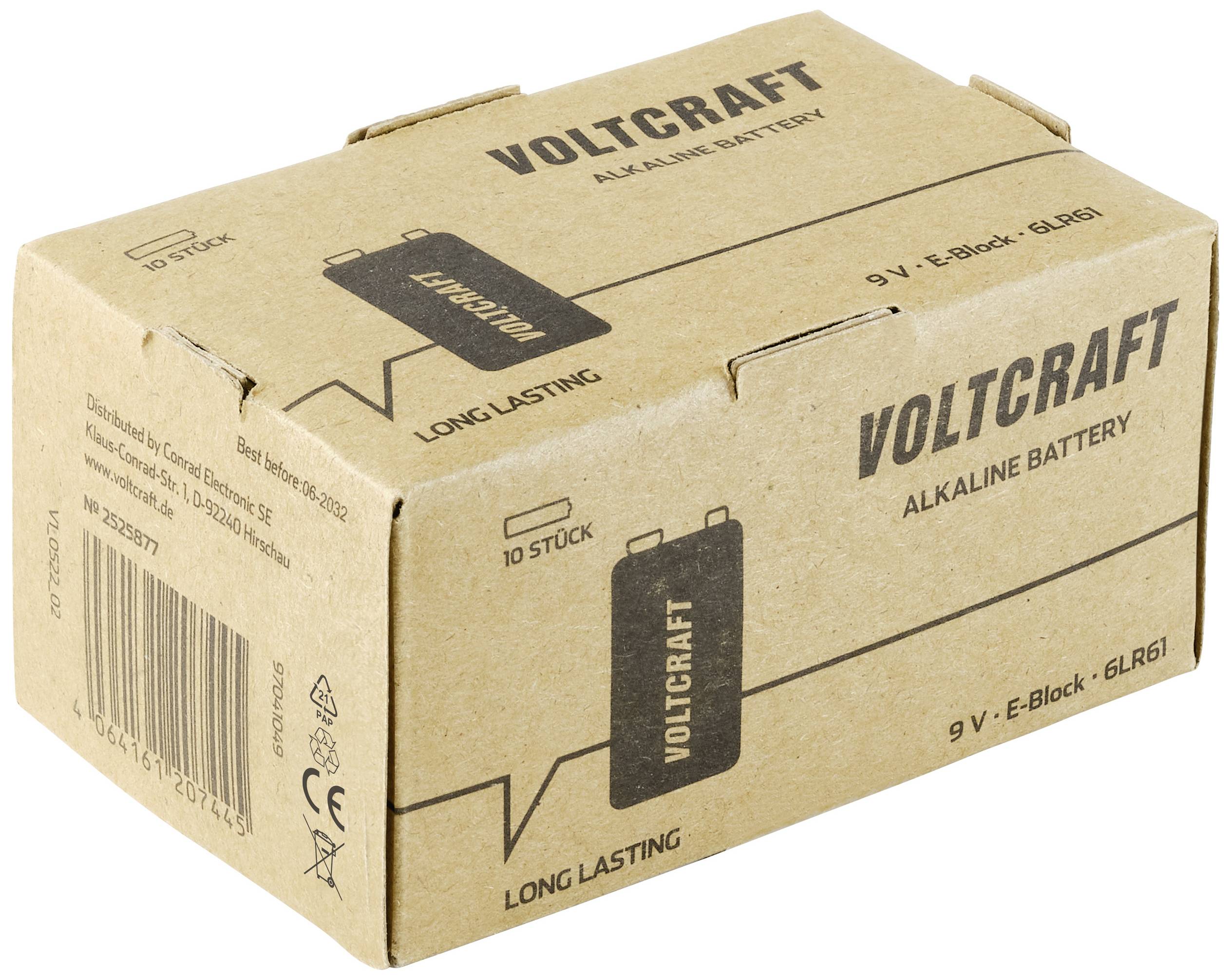 Carton en carton avec l'inscription 'Voltcraft Alkaline Battery', montrant des piles de 9V. Le design suggère une 'longue durée de vie' et une quantité de '10 pièces'.