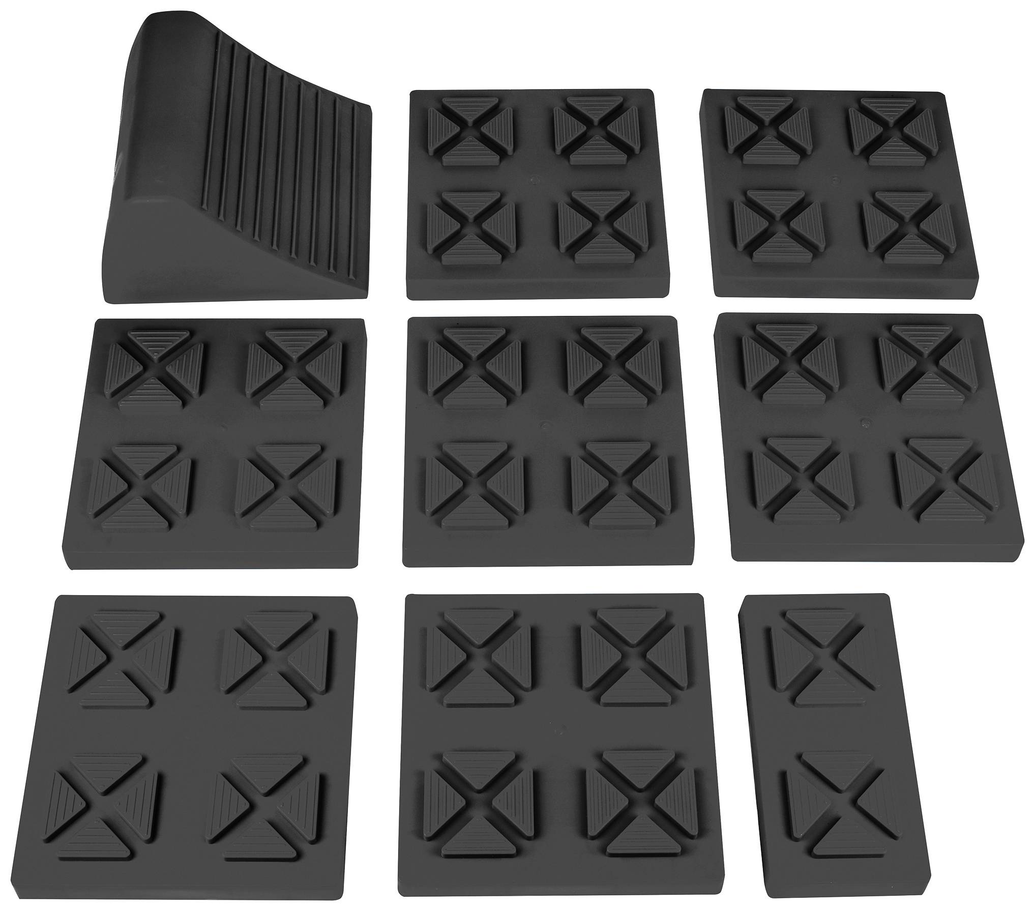 Des coussinets en caoutchouc noir de différentes formes et tailles, disposés en grille. Un coussin incliné en haut à gauche.