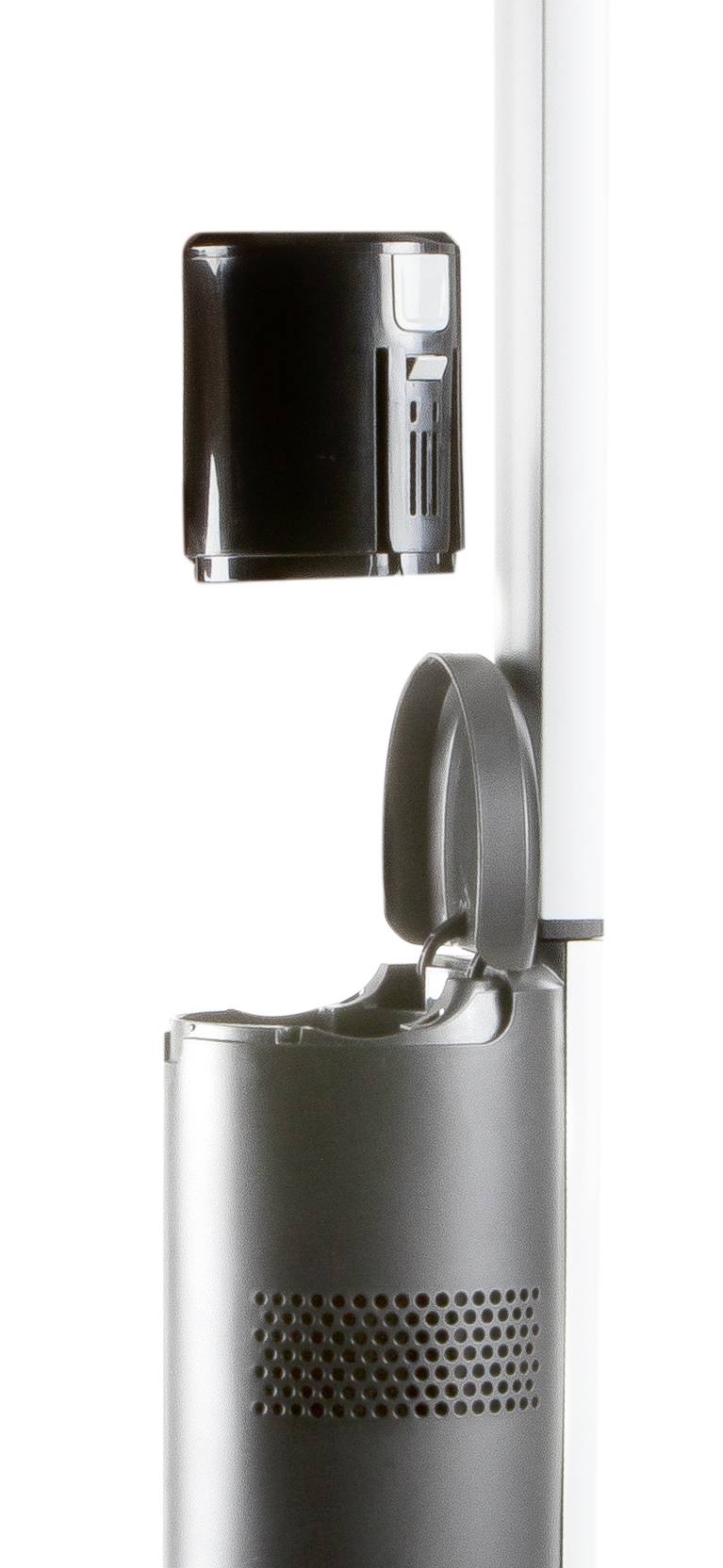 Un appareil à boîtier noir monté sur un support blanc. Il a une forme cylindrique avec des fentes de ventilation en bas.