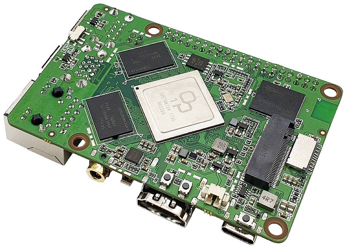 Carte mère d'un ordinateur monocarte avec plusieurs puces et connecteurs, dont HDMI, USB et Ethernet. Idéal pour les projets électroniques.