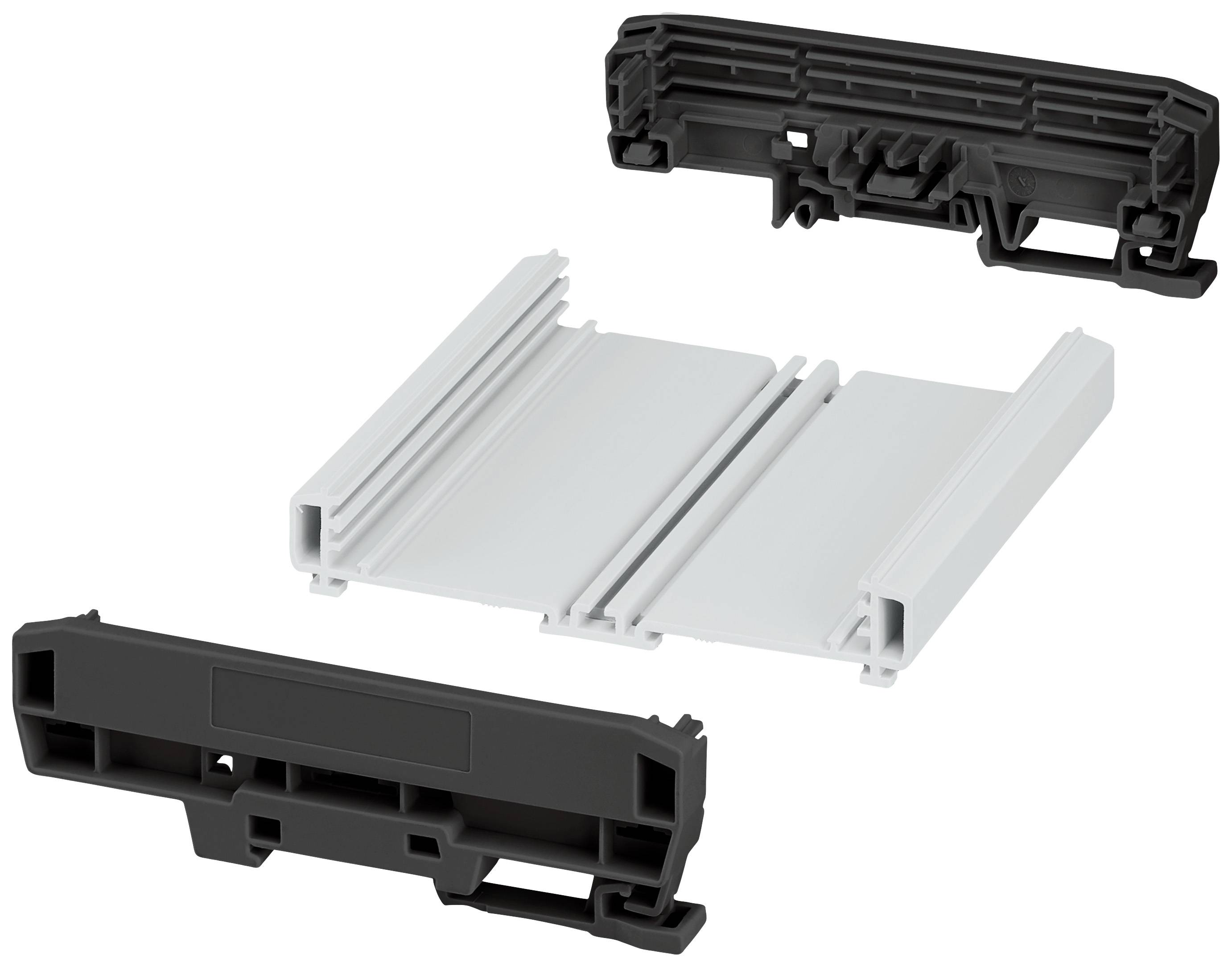 Trois composants en plastique noir et gris qui forment ensemble un système de montage. Ils semblent prêts à être assemblés.