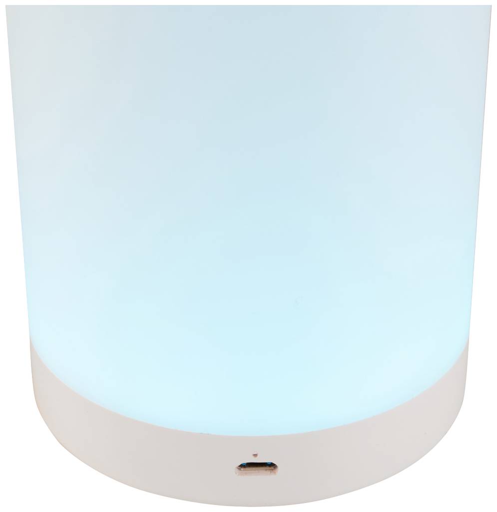 Une lampe de table cylindrique émettant une douce lumière bleue, avec un port USB à la base.