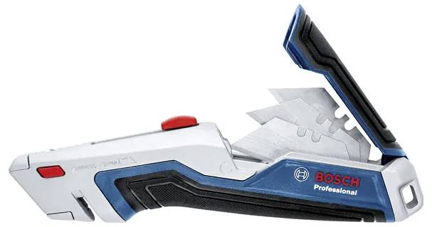 Un couteau utilitaire compact avec un système de lame rétractable et une poignée ergonomique. Il présente un schéma de couleurs bleu, blanc et noir avec un bouton rouge.