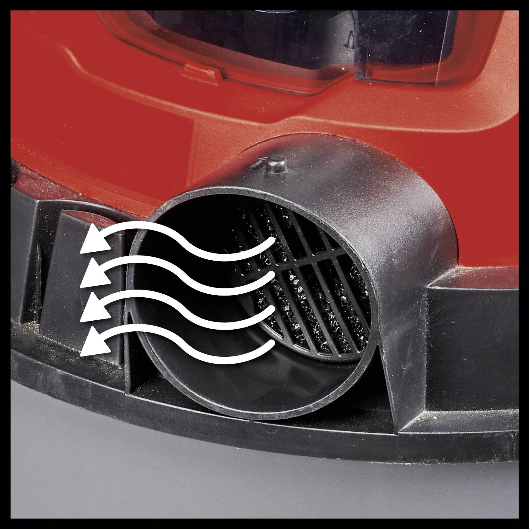 Des flèches de flux d'air s'échappent d'une grille de ventilation circulaire sur un aspirateur, représentant la circulation de l'air.