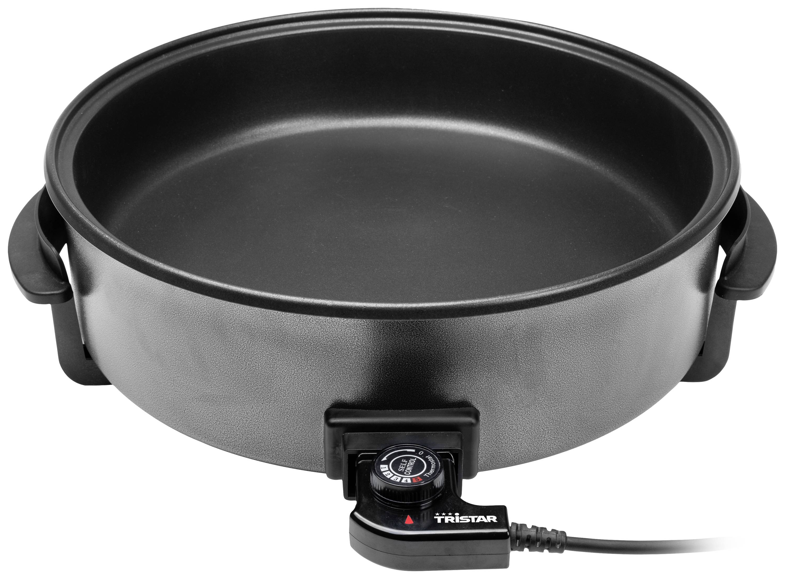 Poêle électrique avec régulateur de température, idéal pour faire sauter et cuire les aliments.