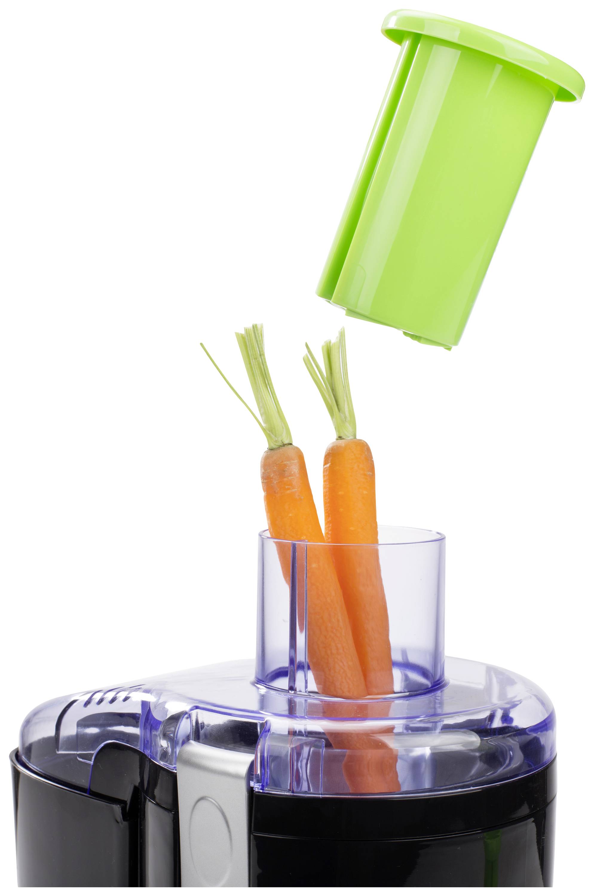 Extracteur de jus avec deux carottes dans la goulotte d'alimentation, le couvercle est soulevé pour lancer le processus de extraction.