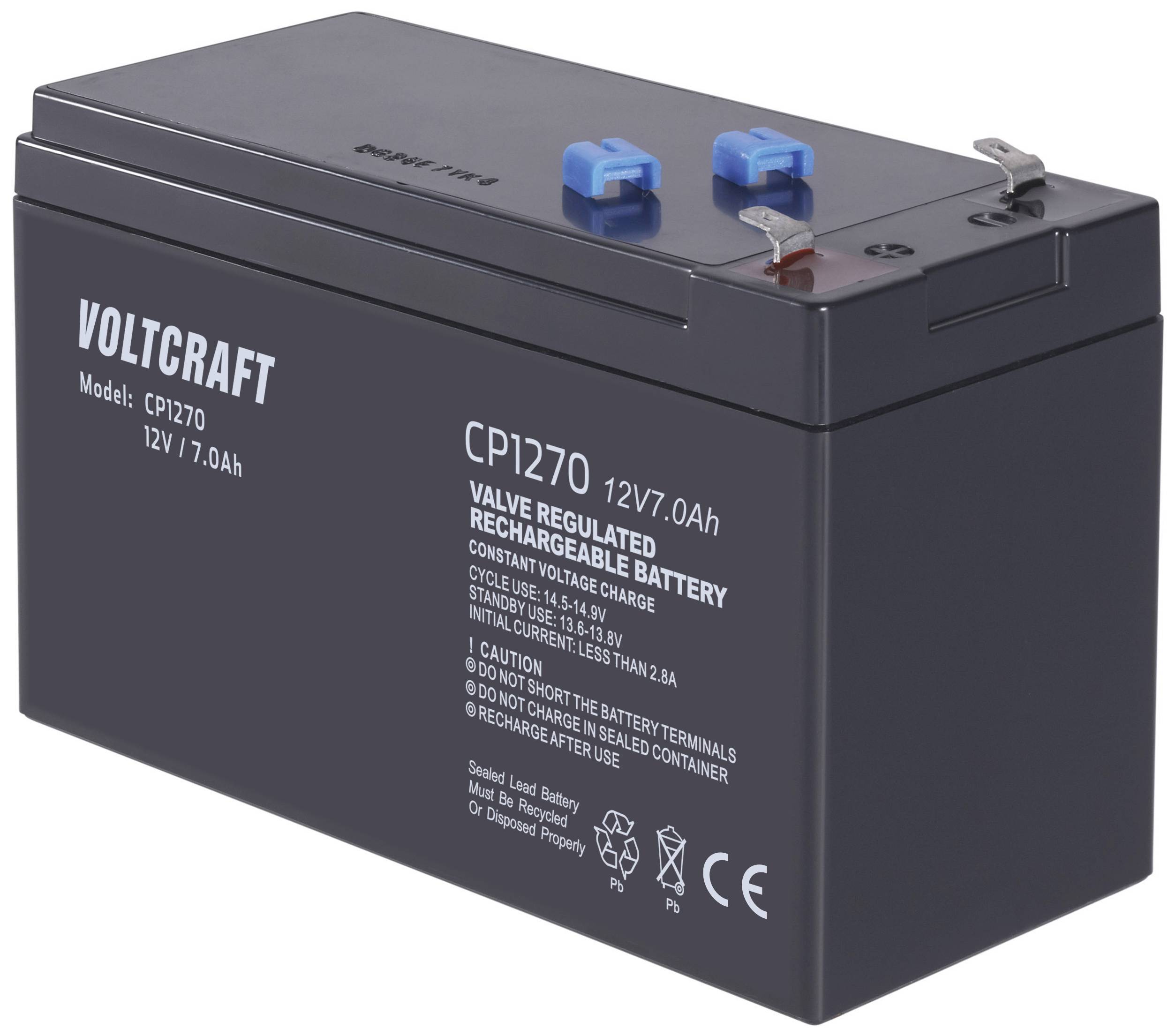 Une batterie Voltcraft noire et rectangulaire de 12V/7.0Ah avec des bornes bleues et rouges sur le dessus et des inscriptions blanches sur le côté.