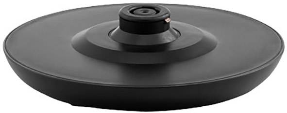 Objet rond noir avec un centre surélevé, probablement un composant technique ou mécanique, sur un fond blanc.