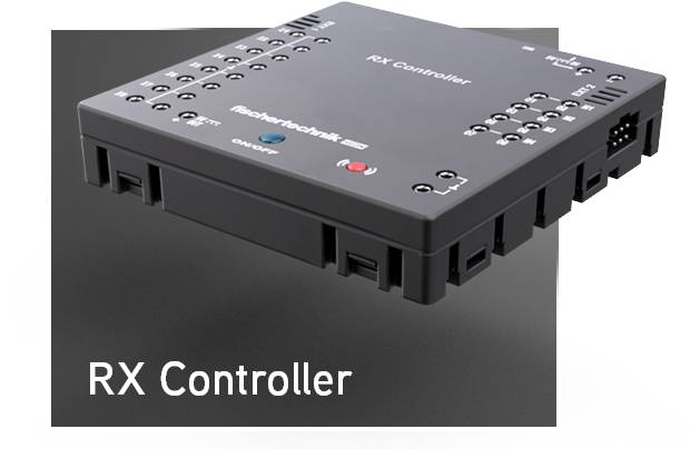 Un contrôleur RX noir avec plusieurs options de connexion et des voyants LED. Le nom de la marque et l'inscription 'RX Controller' sont visibles.