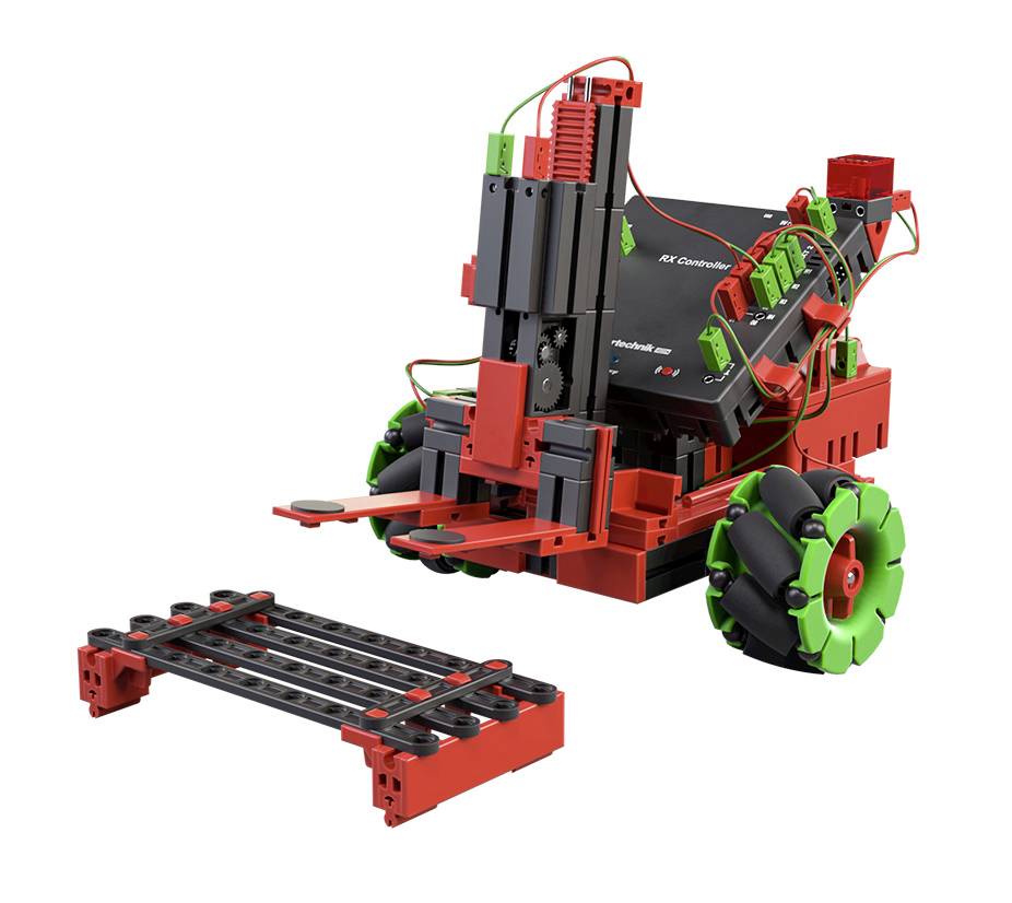 Un kit de robotique rouge et vert, composé de plusieurs modules et pièces, incluant des roues et des composants structurels.