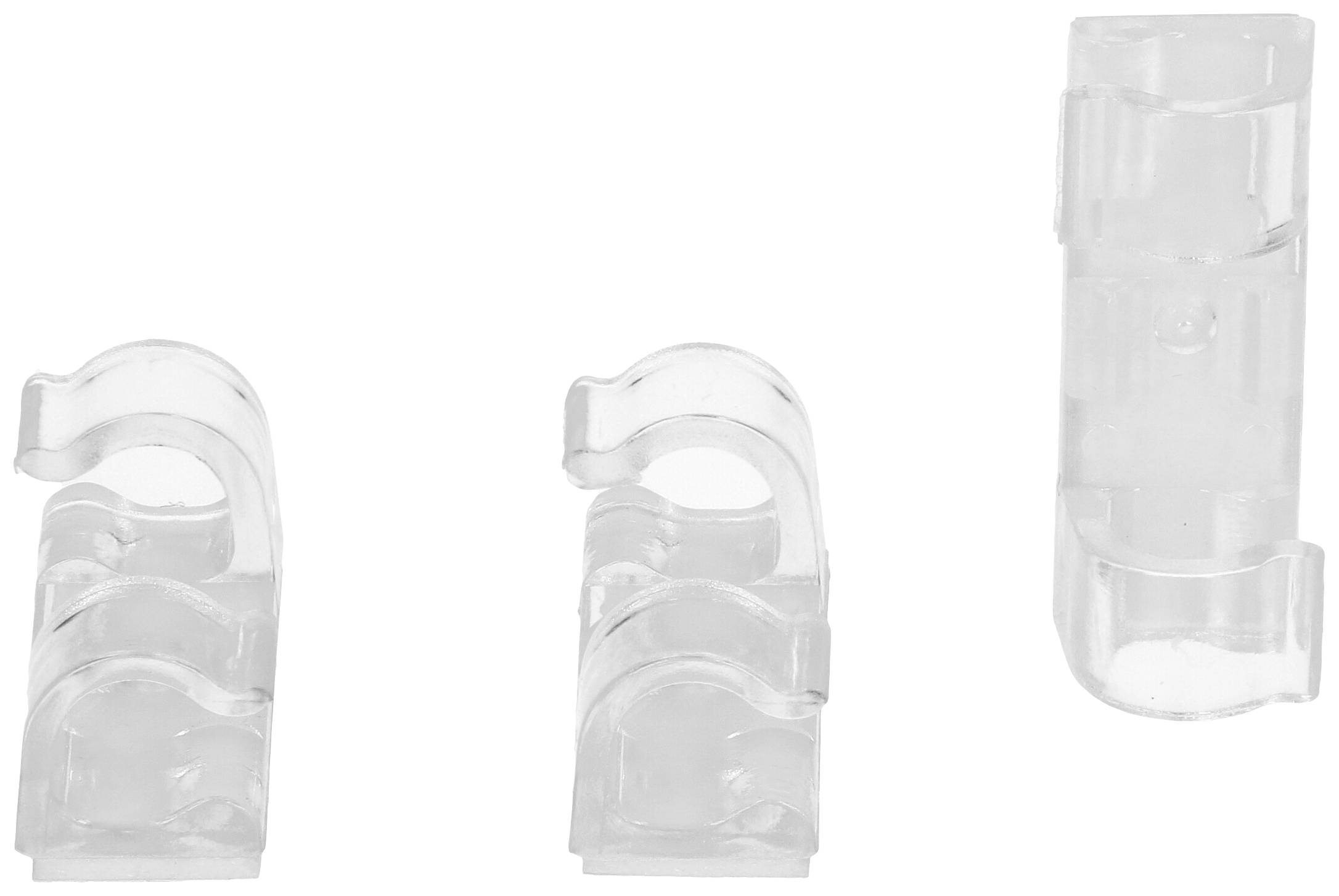 Trois clips de câble transparents ; un à droite plus grand, pour l'organisation des câbles.
