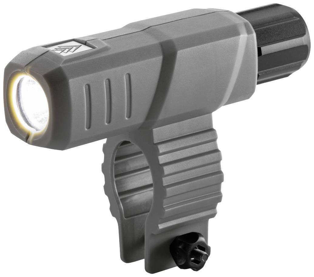 Lampe de vélo grise, montée sur un support. La lampe est allumée et éclaire vers l'avant.