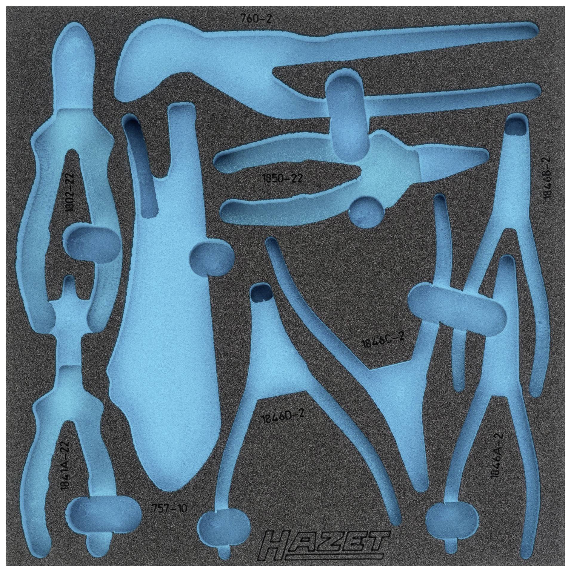 Insert en mousse avec des formes découpées pour différents outils. Les insertions bleues contiennent des gravures avec les numéros des outils.