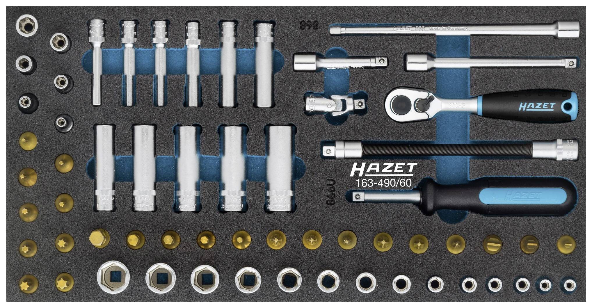 Ensemble d'outils comprenant des clés à douille, des rallonges et une clé à molette, disposés dans un insert en mousse.