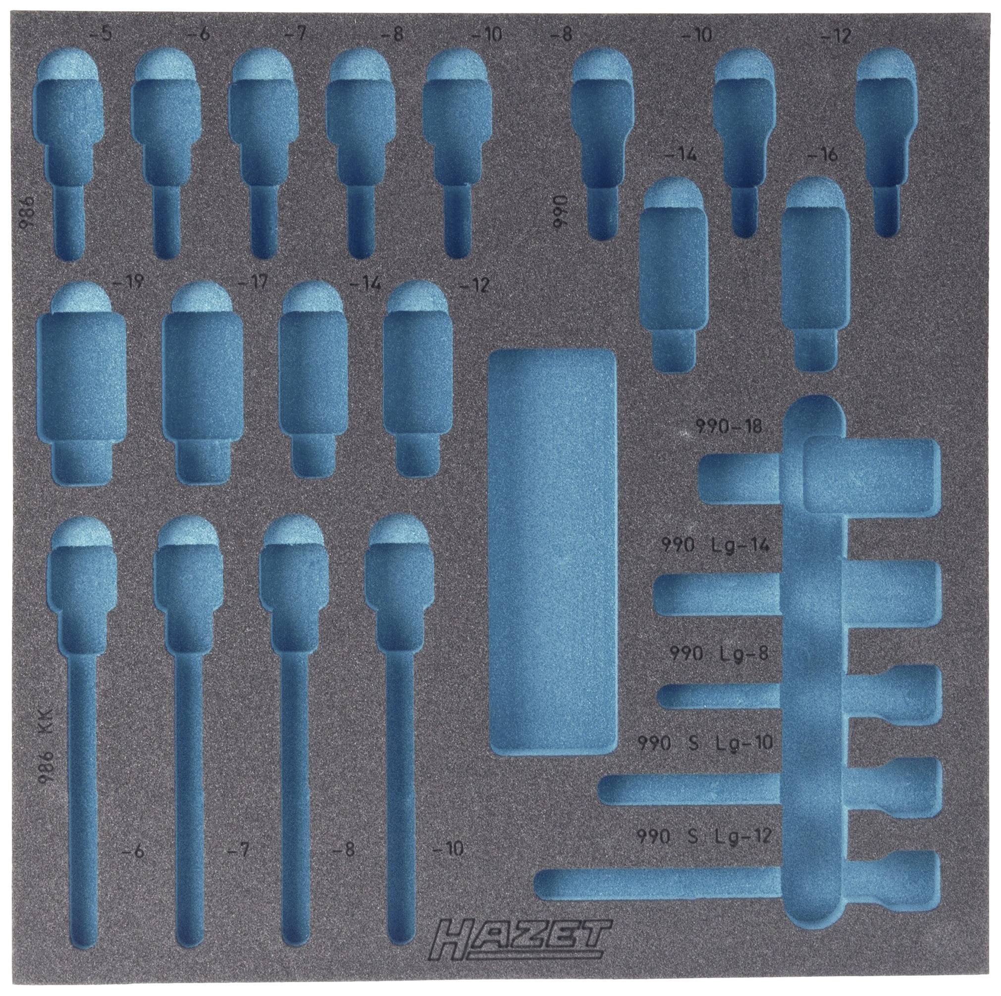 Un insert en mousse présente des découpes précises de différentes tailles pour divers outils.