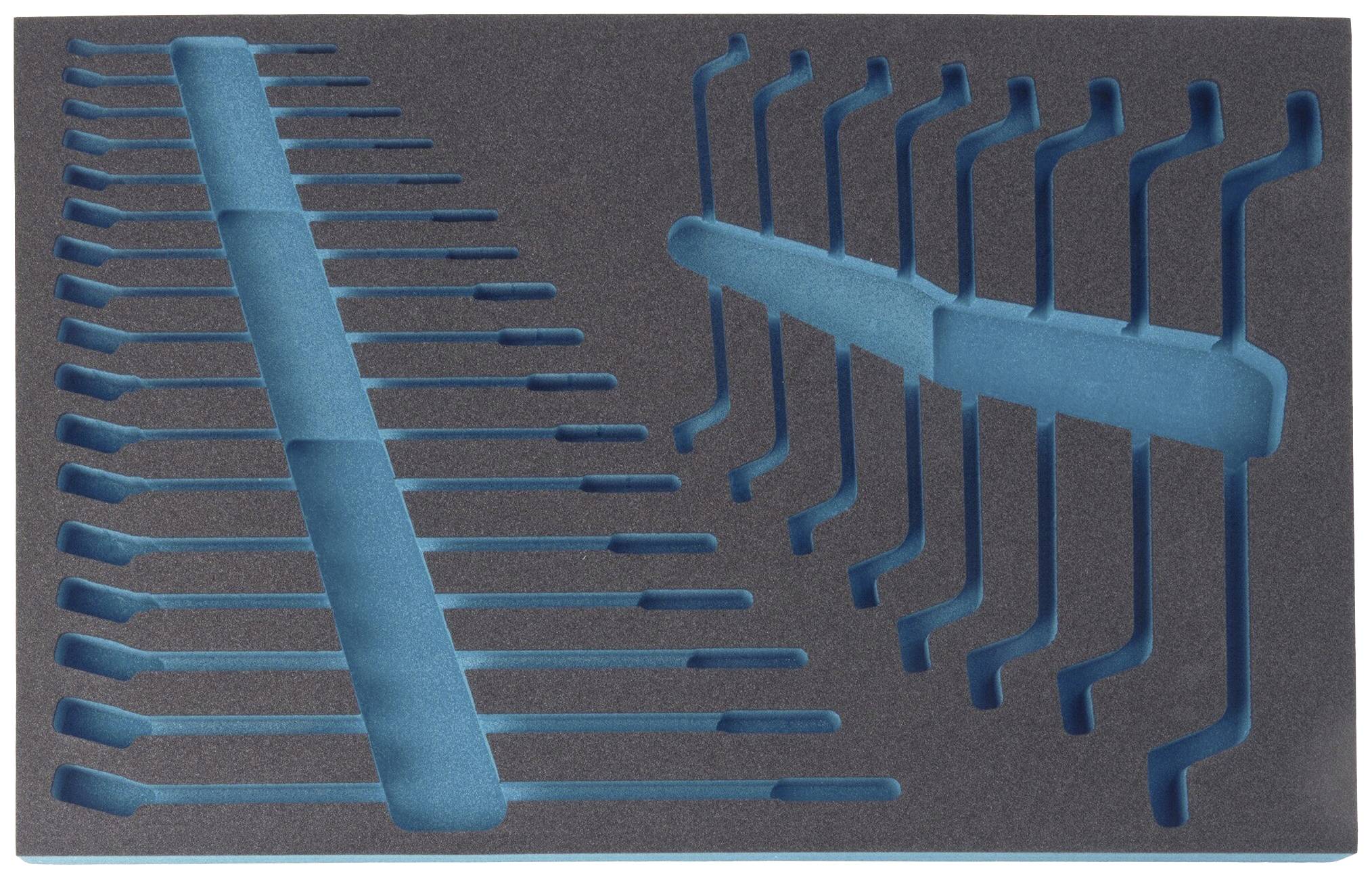 Garniture en mousse avec découpes pour outils de différentes tailles.