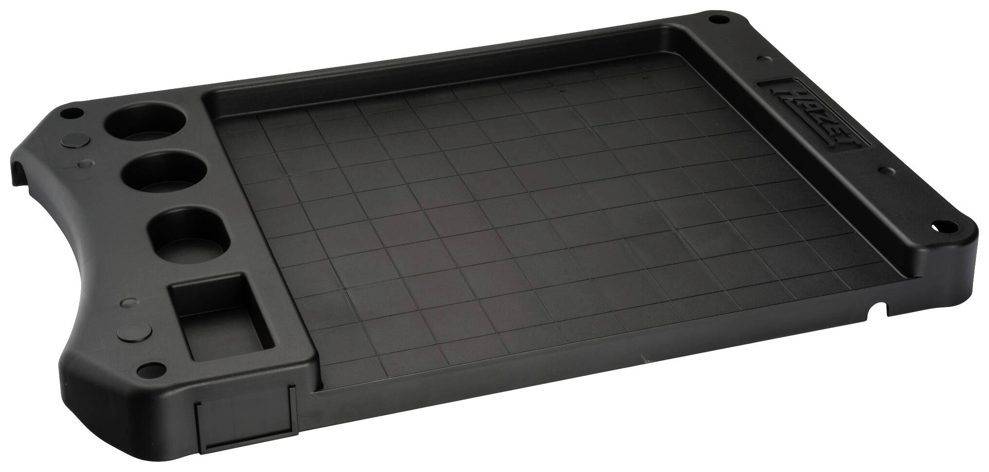 Plateau en plastique noir avec plusieurs découpes rondes et rectangulaires, probablement utilisé pour trier ou ranger des pièces d'outillage.