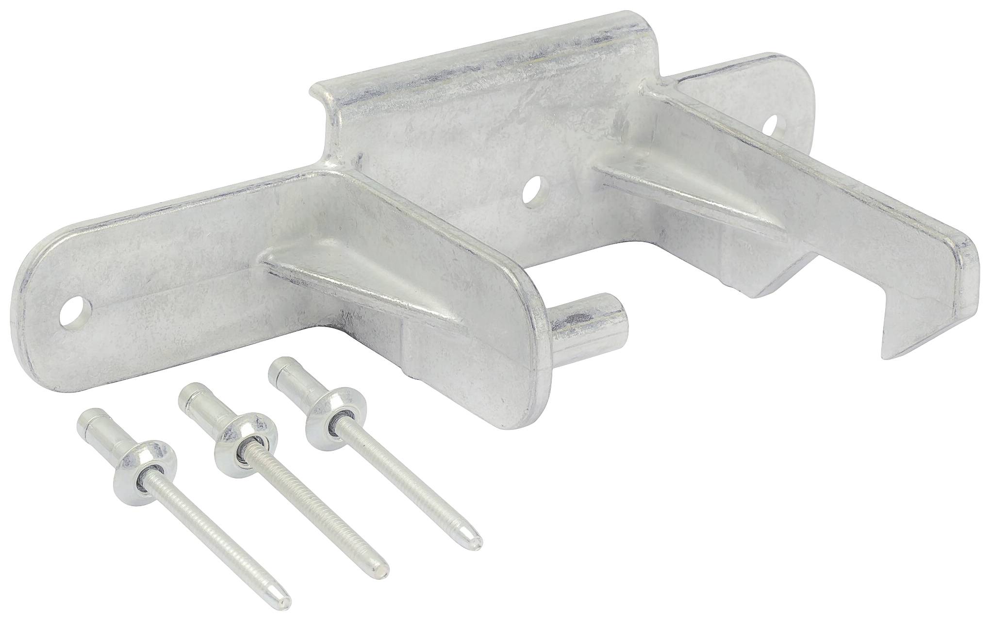 Un élément de fixation métallique argenté à côté de trois rivets.