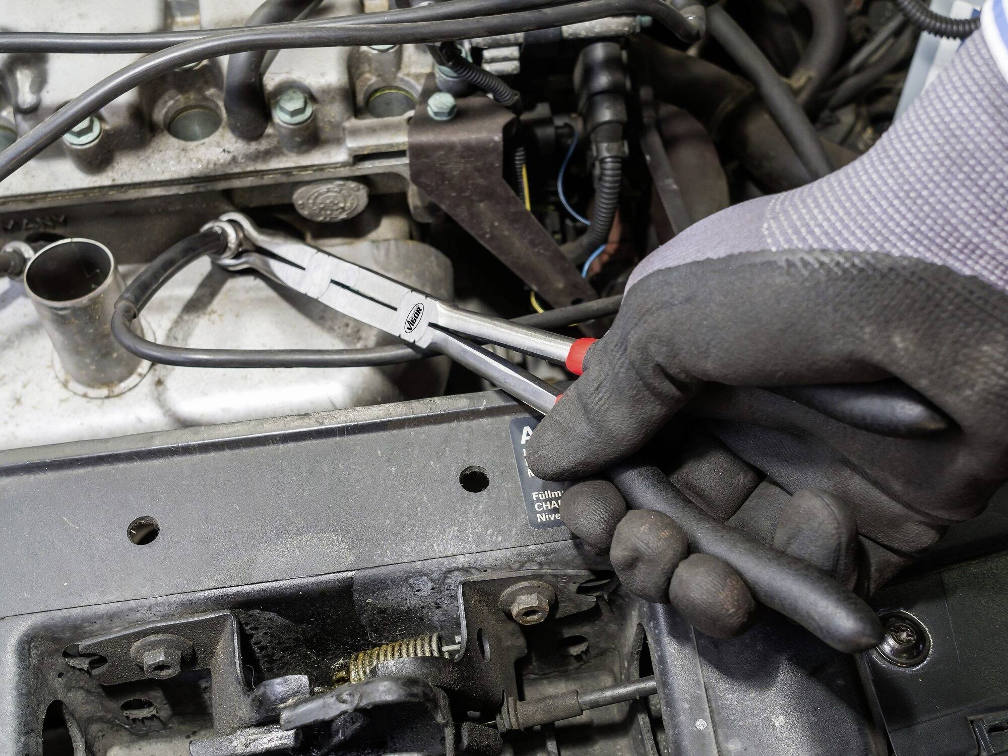 Vigor V5494 Pince à bougie avec double articulation