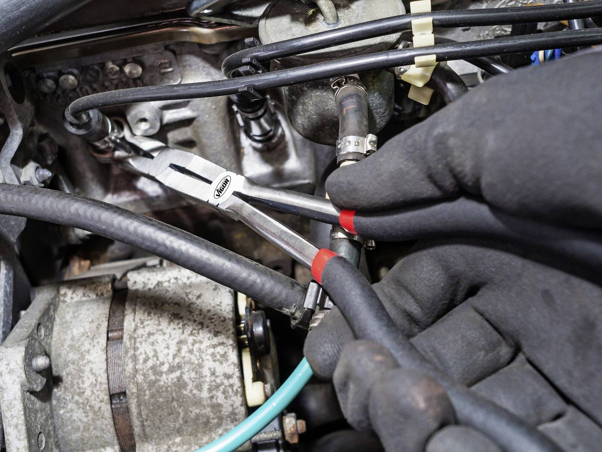 Vigor V5494 Pince à bougie avec double articulation