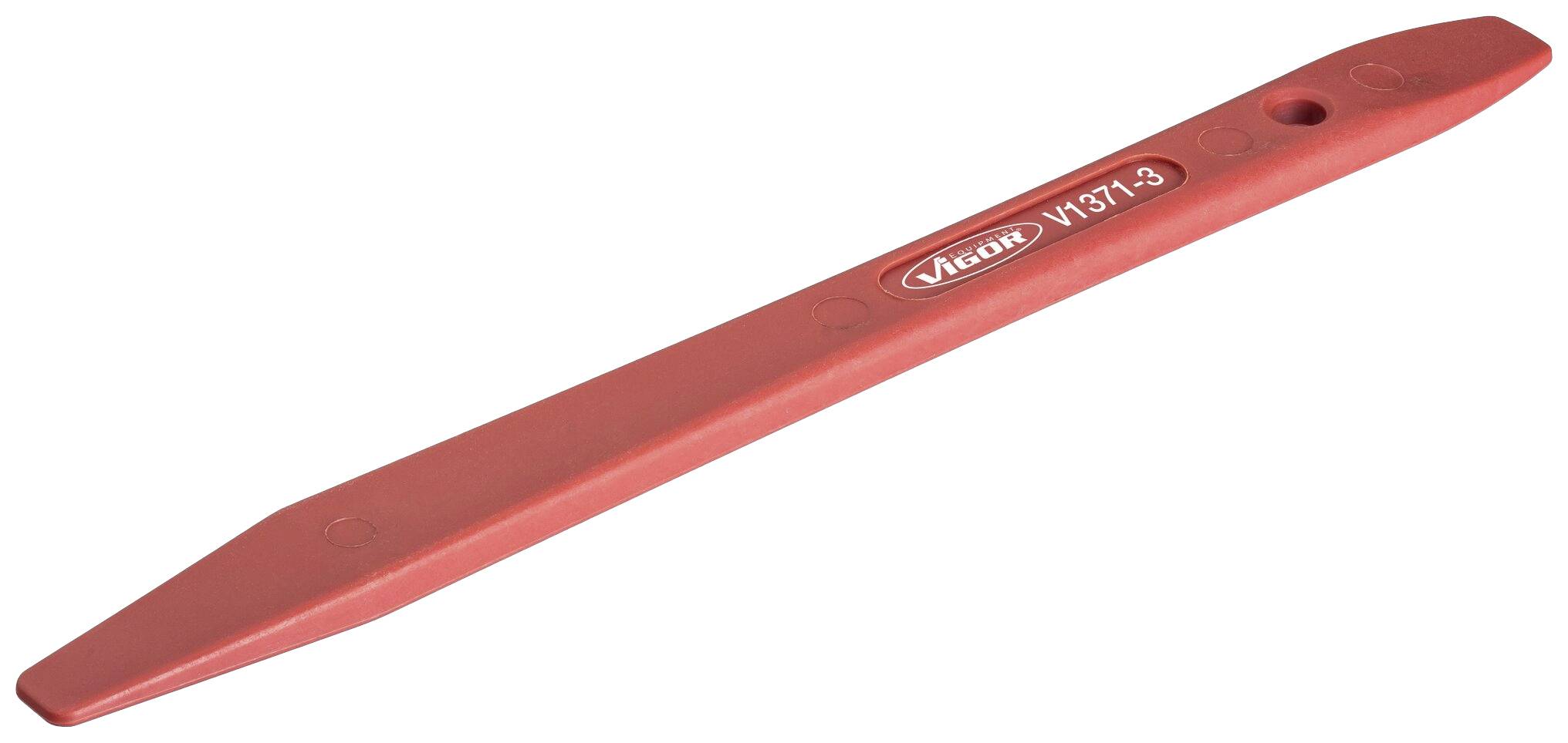 Un démonte-pneu rouge en plastique avec des extrémités arrondies et une petite ouverture à une extrémité, utilisé pour démonter les pneus de vélo.
