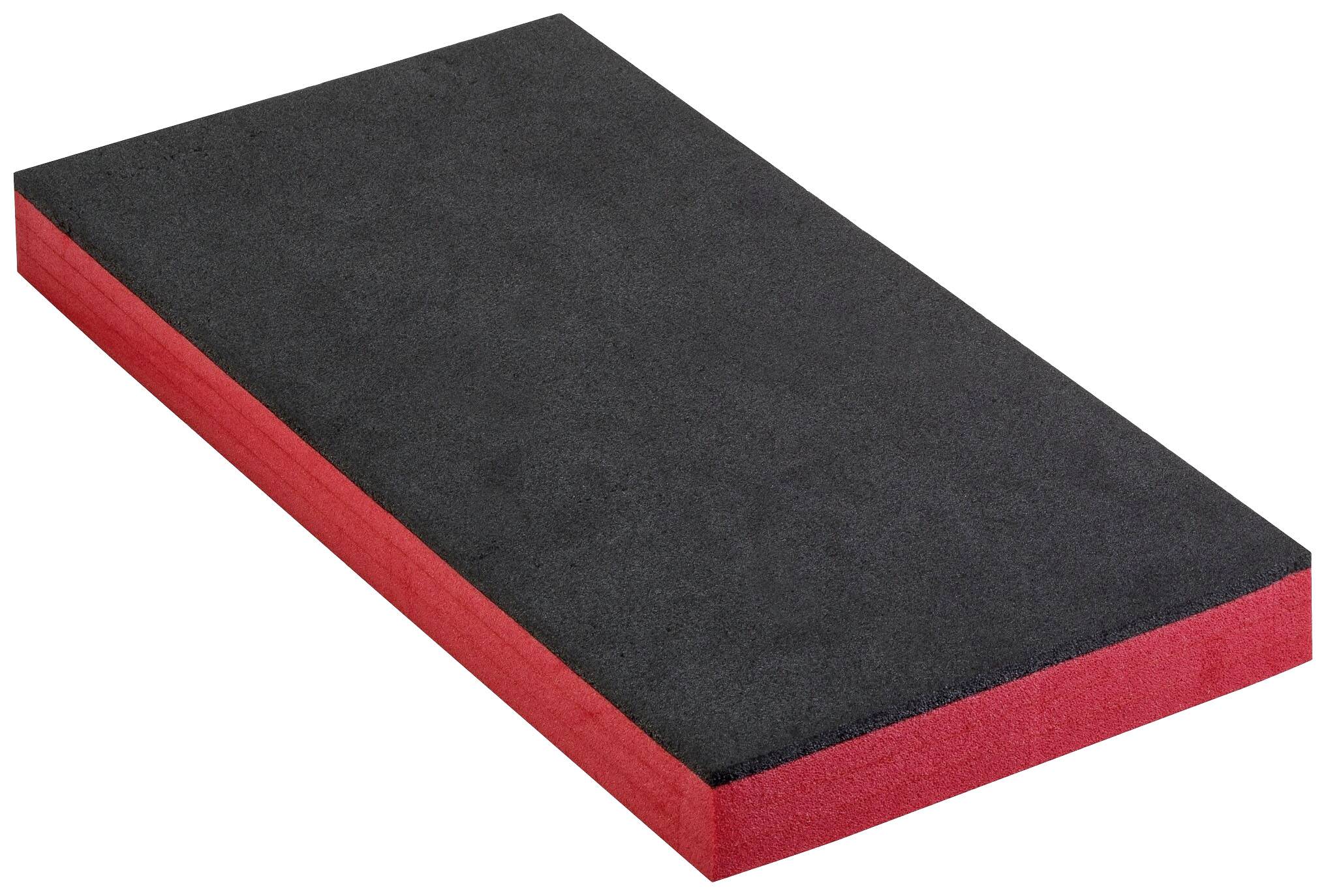 Bloc de mousse rectangulaire avec une surface supérieure noire et un fond rouge, souvent utilisé pour la protection ou le rembourrage.