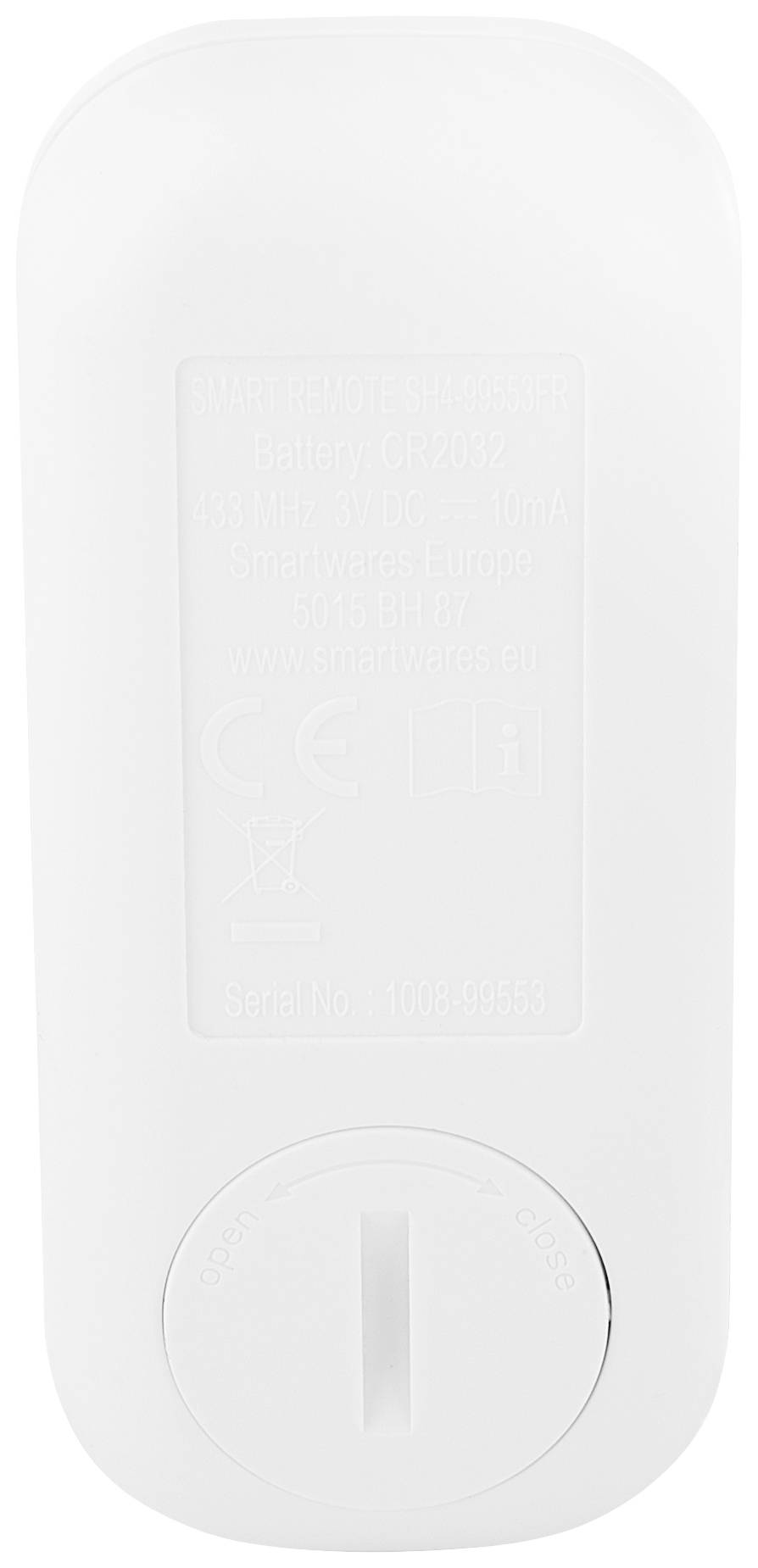 Appareil électronique blanc avec certification CE et informations techniques imprimées au dos, interrupteur en bas.