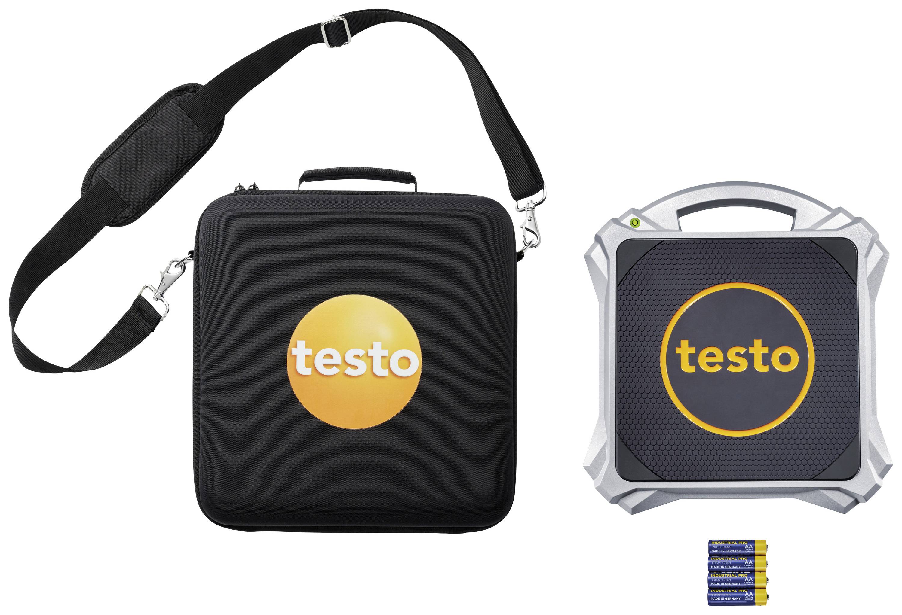 Sac de transport avec logo 'testo', à côté un appareil de mesure carré portant le même logo et un jeu de batteries.