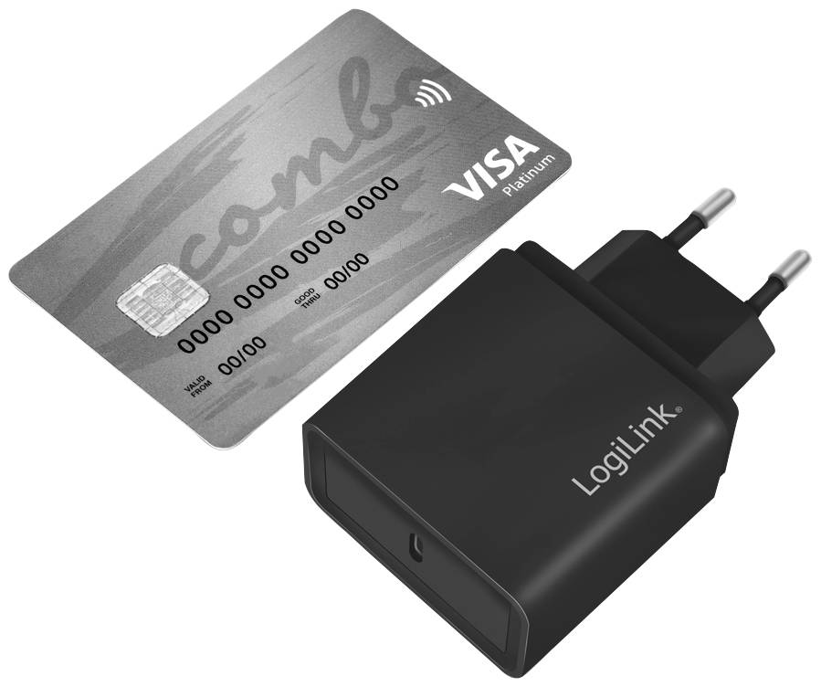 Une carte de crédit avec le symbole NFC est posée à côté d'un chargeur USB noir.