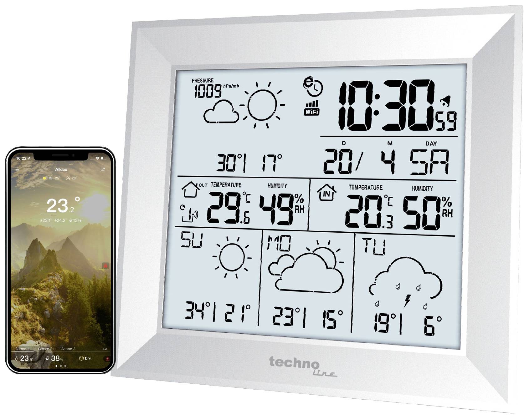Station météorologique avec un grand écran affichant la date, l'heure, la température, l'humidité et les prévisions météorologiques. Smartphone à côté avec une application météo.