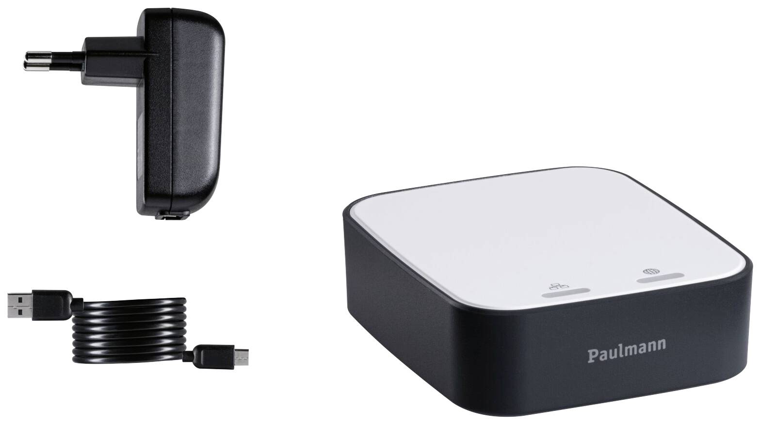 Un adaptateur blanc avec un bord noir, un câble USB et une fiche à côté. Appareil de 'Paulmann', probablement pour l'éclairage.