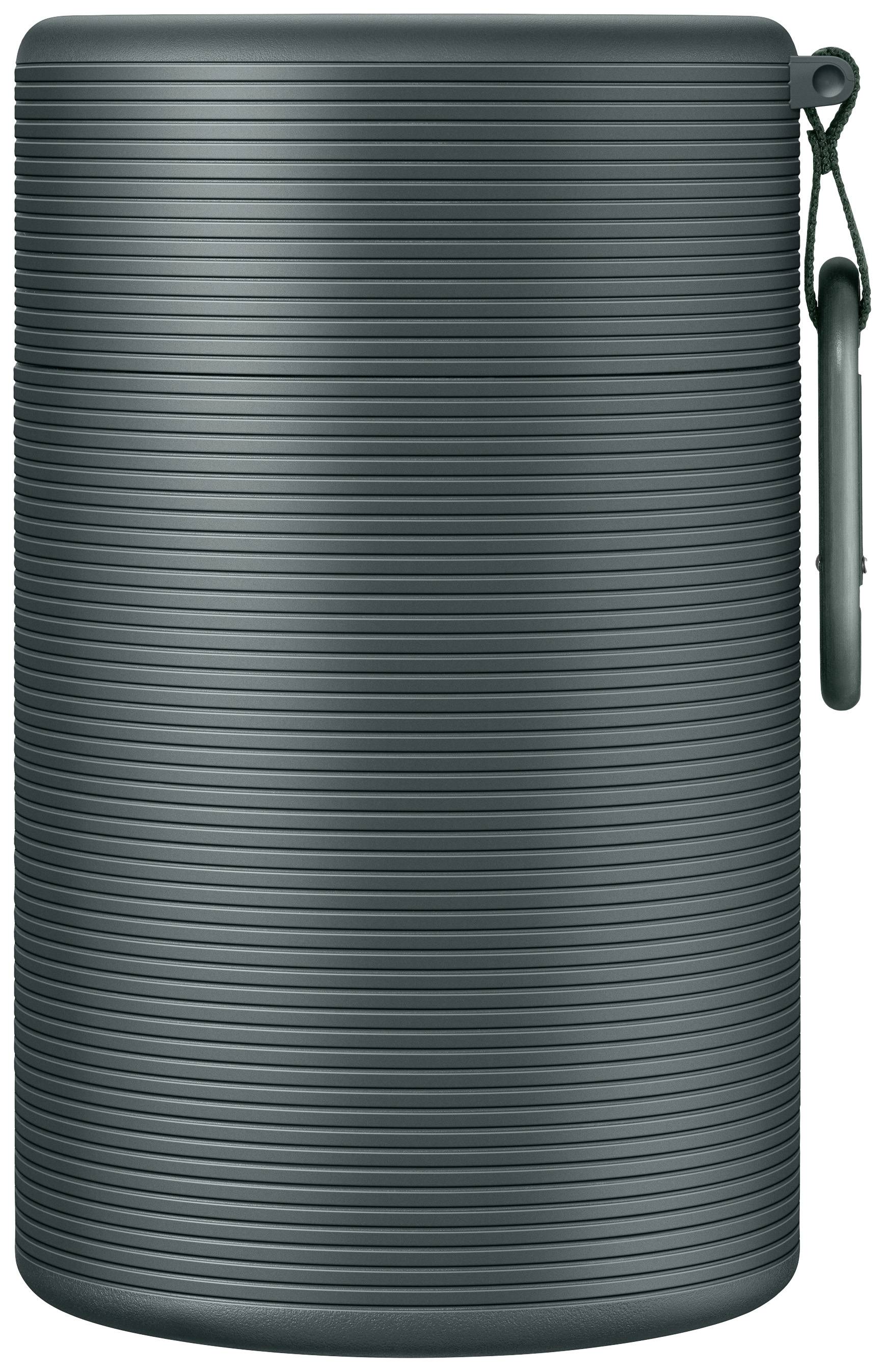 Enceinte Bluetooth portable cylindrique en gris foncé, à surface texturée et avec une boucle de transport sur le côté.