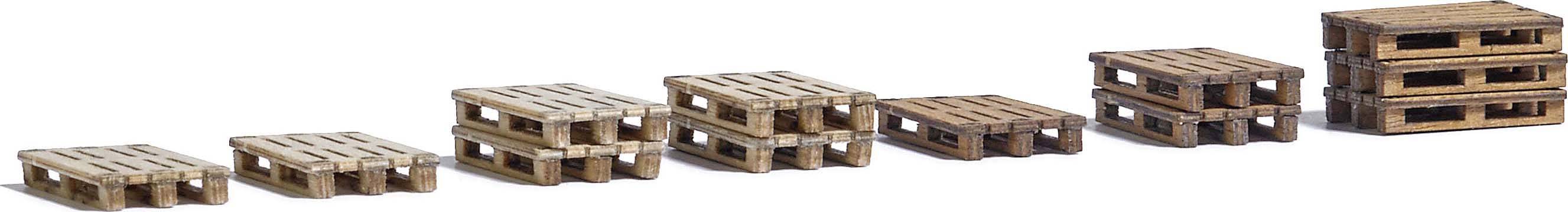 Des palettes miniatures disposées de manière croissante, du plus petit au plus grand, symbolisent l'augmentation ou la croissance.