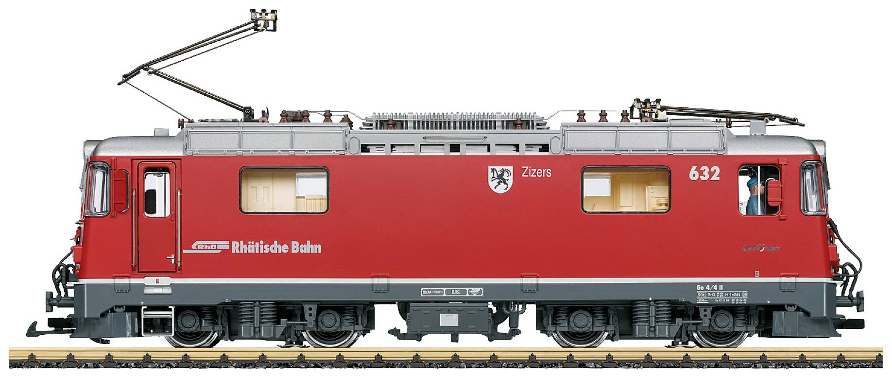 Locomotive rouge du Chemin de fer rhétique sur une voie. Vue latérale montrant les détails de la construction. Numérotée '632', étiquetée 'Klosters'.