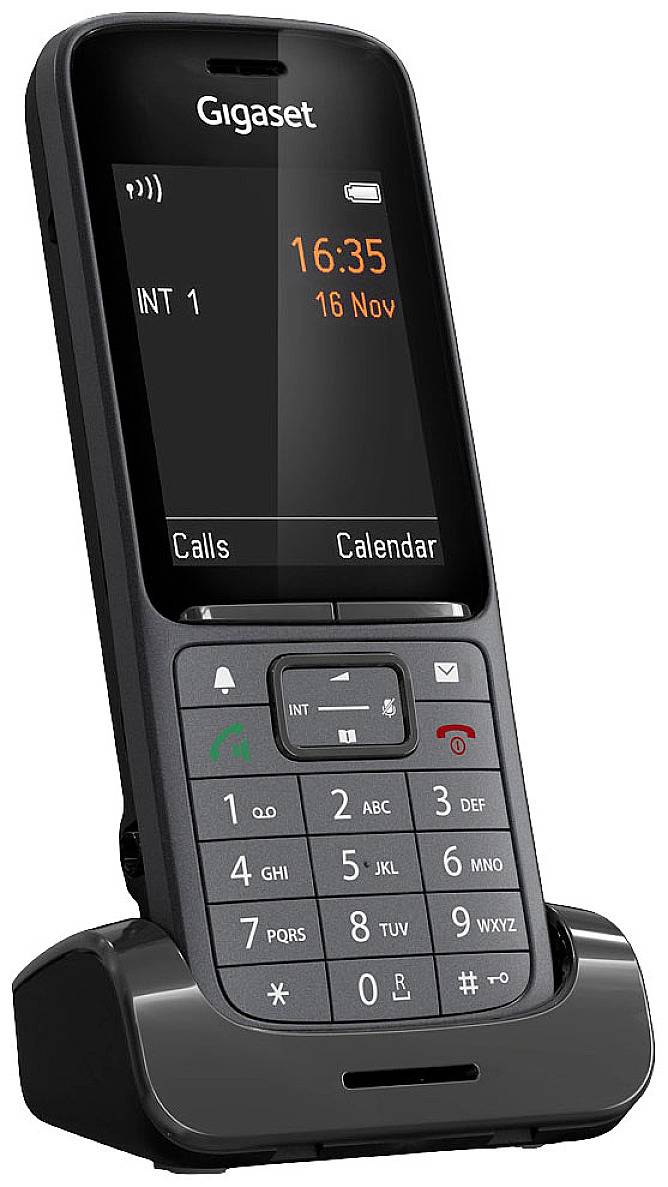 Téléphone sans fil avec affichage LCD, indiquant '16:35, 16 nov', clavier visible ; fonctions principales : appels, agenda.