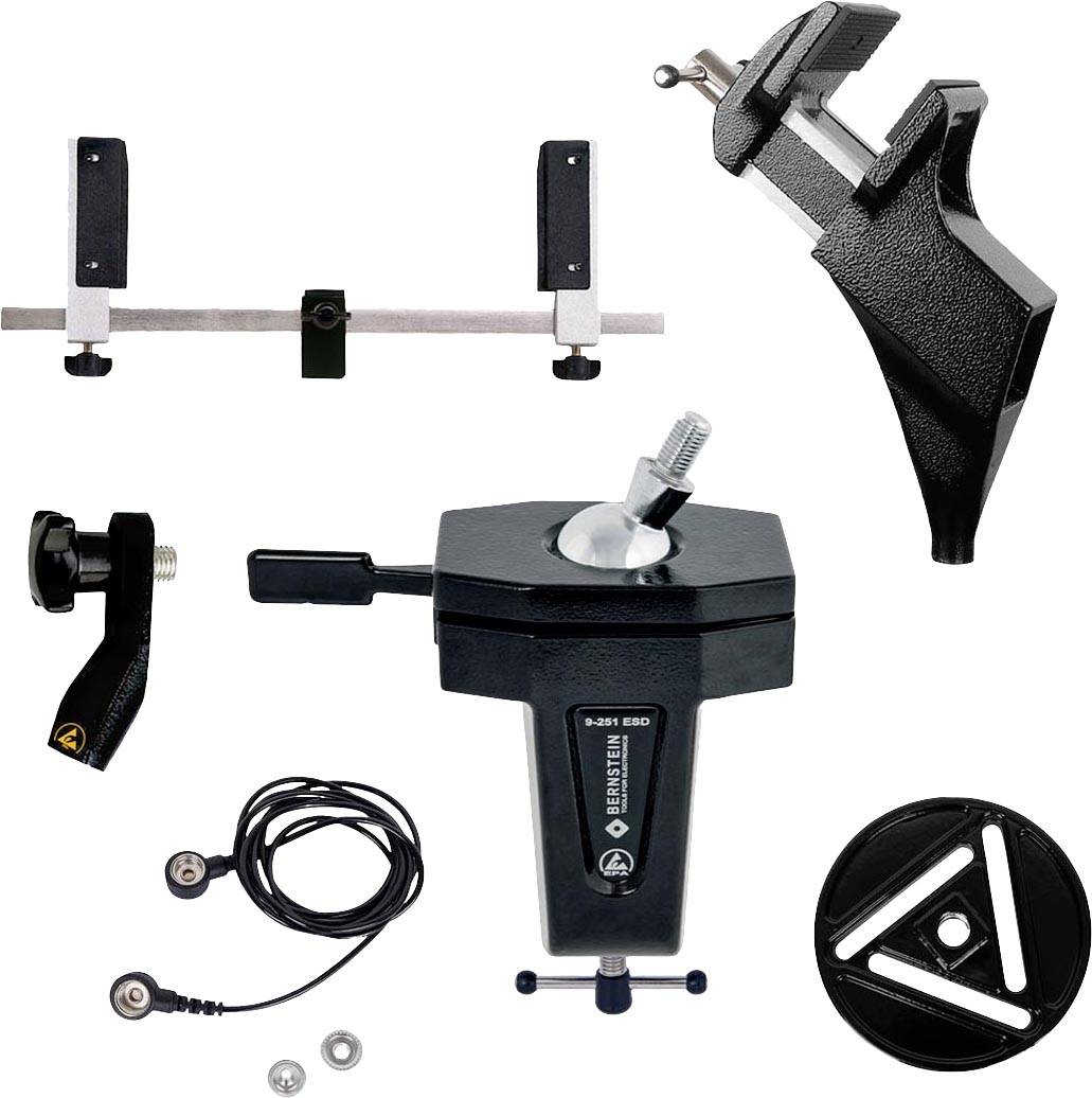 Ensemble d'outils et d'accessoires, comprenant un étau, une pince, des supports et un câble avec deux connexions.