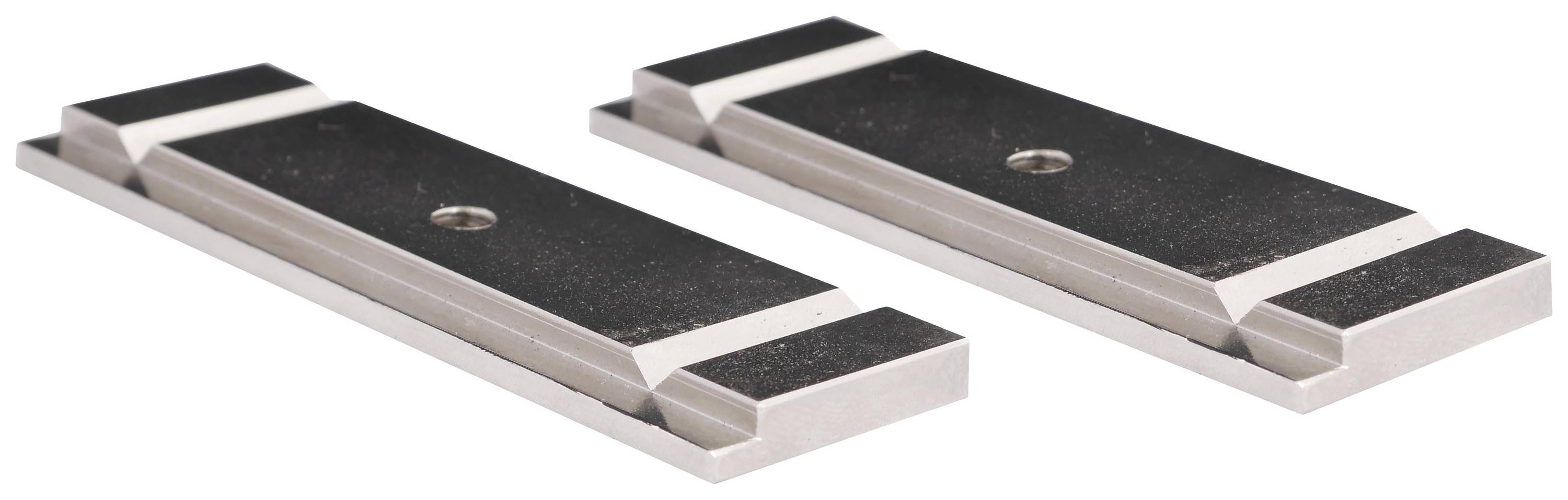 Deux plaques métalliques noires et argentées de forme rectangulaire, percées d'un trou de fixation en leur centre. Elles semblent être des composants techniques.