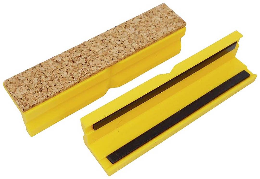 Deux blocs de ponçage jaunes, l'un avec une surface en liège, l'autre en caoutchouc, sont posés sur un fond blanc.