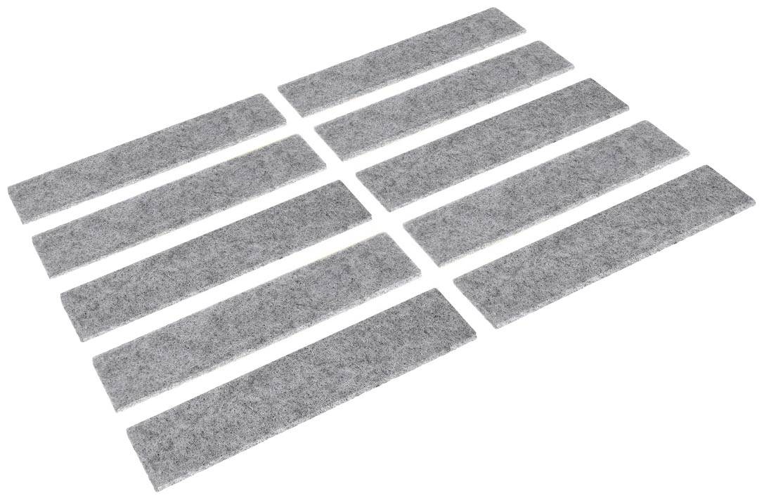 Dix bandes de feutre gris, disposées côte à côte sur une surface blanche.