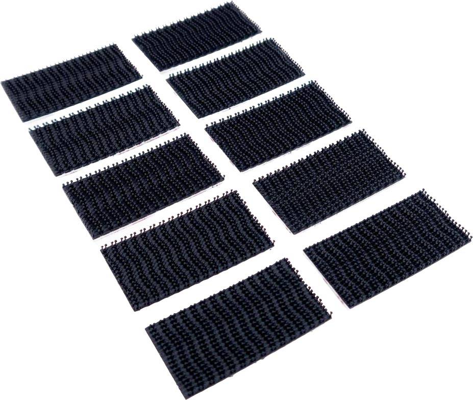 Dix fermetures auto-agrippantes noires rectangulaires, disposées uniformément en deux rangées, montrent la surface à crochets.