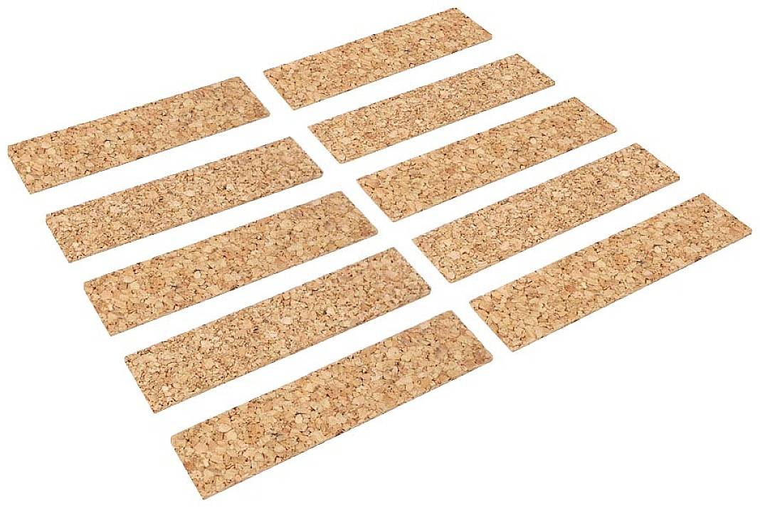 Dix bandes de liège rectangulaires, disposées de manière uniforme en deux rangées.